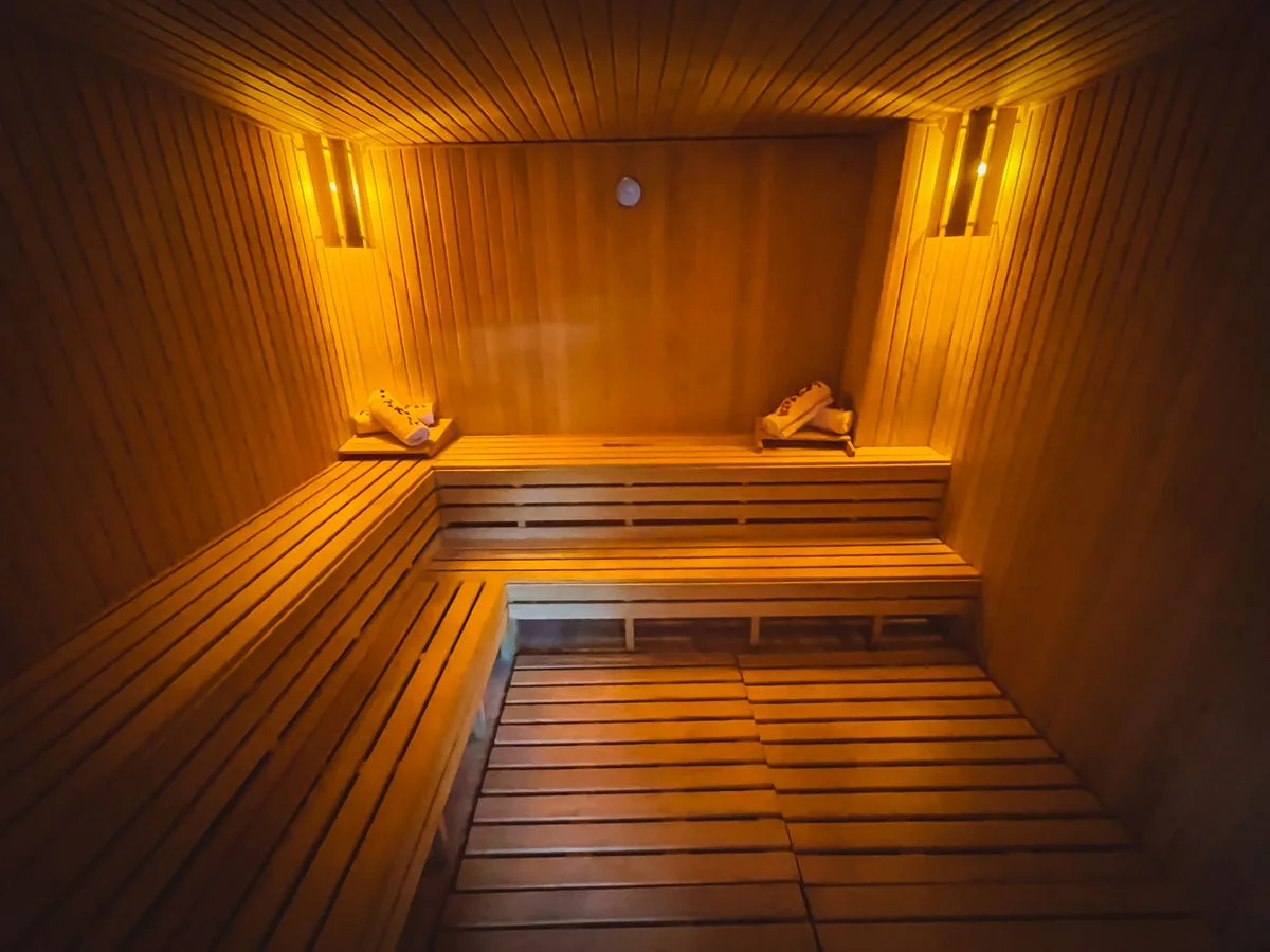 Cosy wooden Finnish sauna interior — recovery facilities included in premium Malta gym memberships