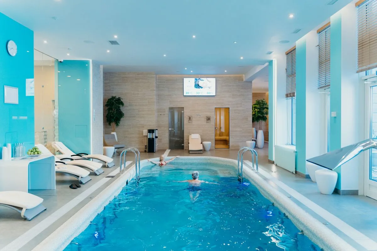 Gym day pass Malta — indoor pool at a wellness club showing facilities excluded from standard day passes